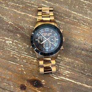 Michael Kors watch. Like new. Needs a battery.
